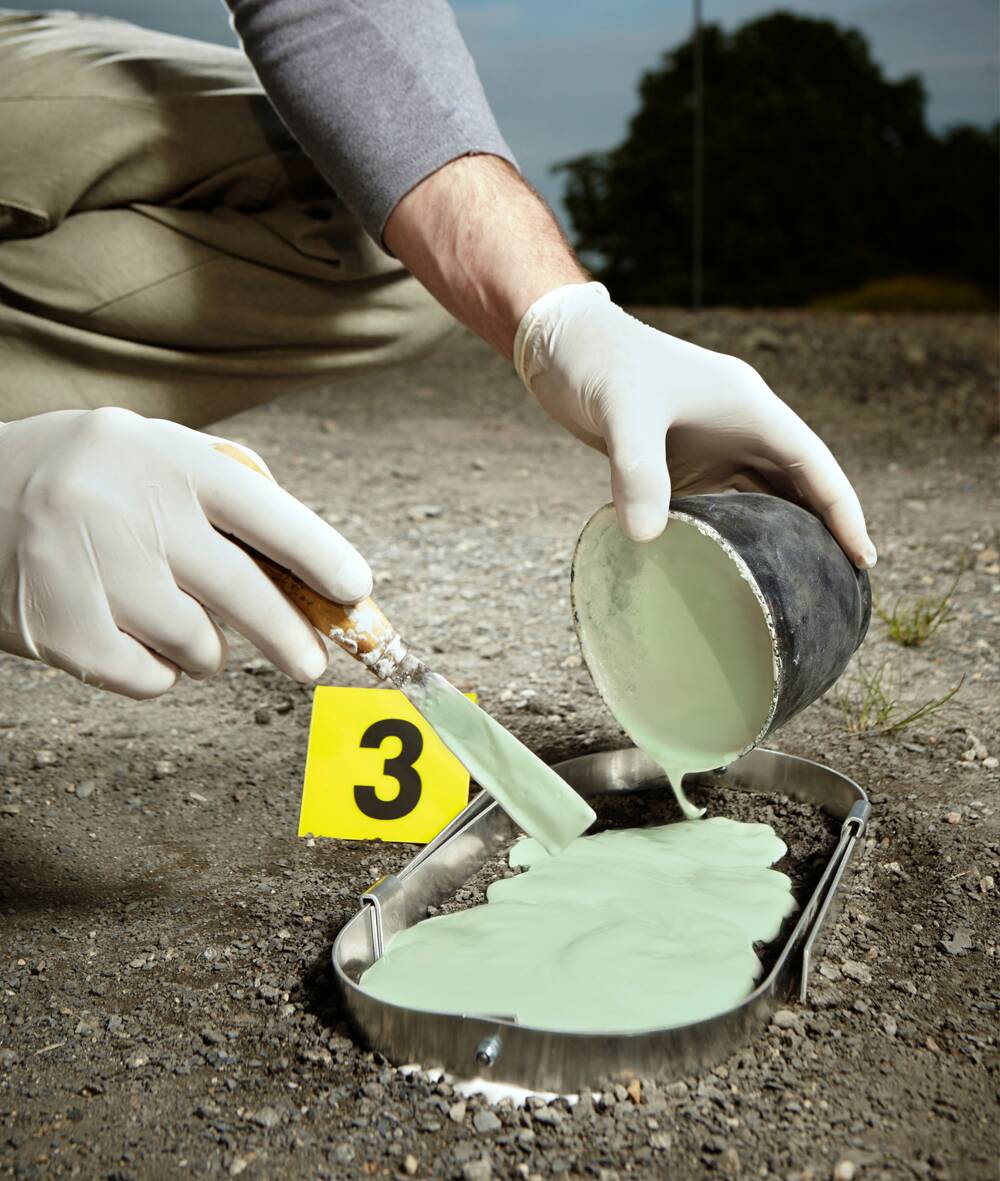 forensic technician using Trackrite Forensics Casting Material